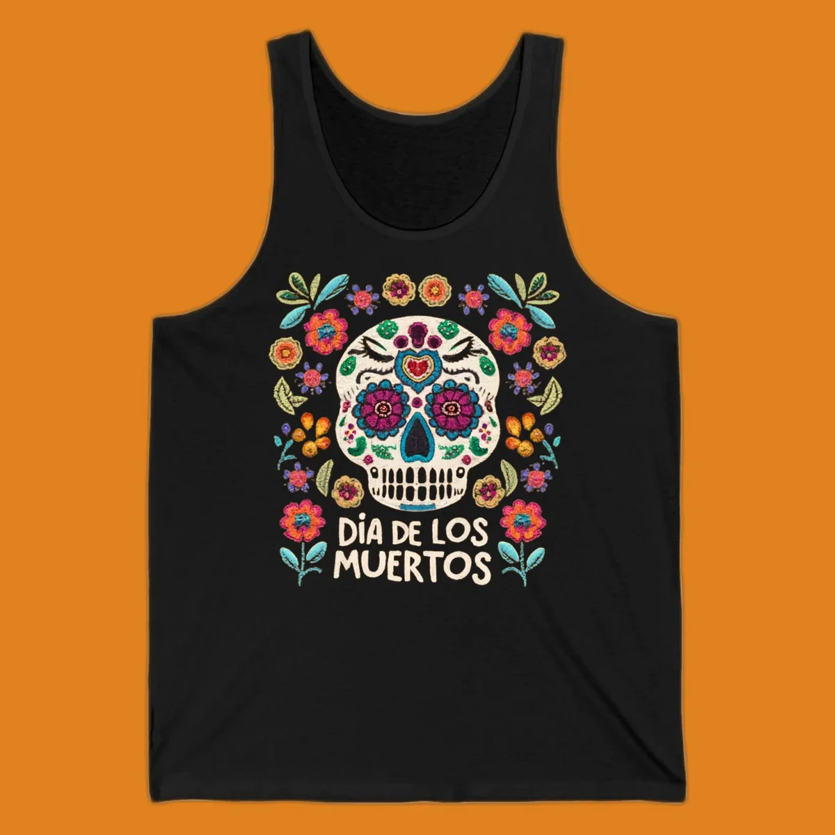 Embroidered-style Día de los Muertos sugar skull with colorful flowers and leaves, and text 'DÍA DE LOS MUERTOS'.