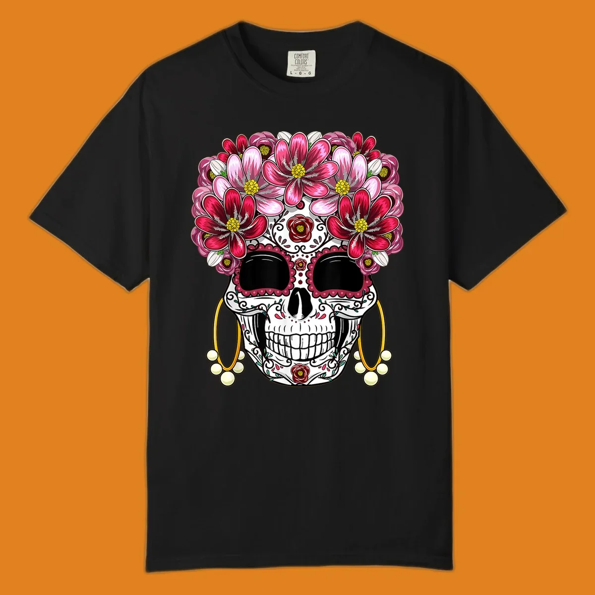 An ornate floral sugar skull with a crown of pink and red flowers, scrollwork, and pearl earrings on a black background.