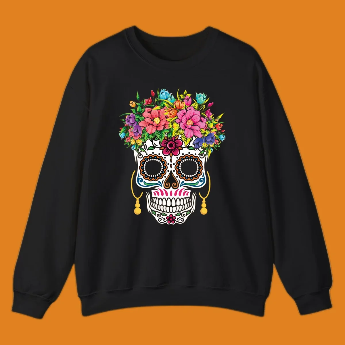 A vibrant floral calavera skull with a large, colorful flower crown and decorative patterns, featuring gold earrings.