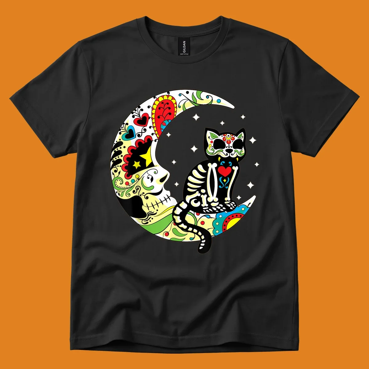 A colorful sugar skull cat with a skeleton body sits on a crescent moon decorated with skull and floral patterns. Features a sugar-skull-cat-moon.