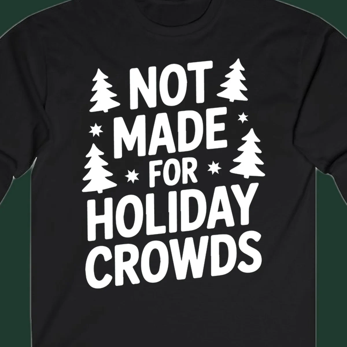 Typography design with 'NOT MADE FOR HOLIDAY CROWDS' text, Christmas trees, and stars.