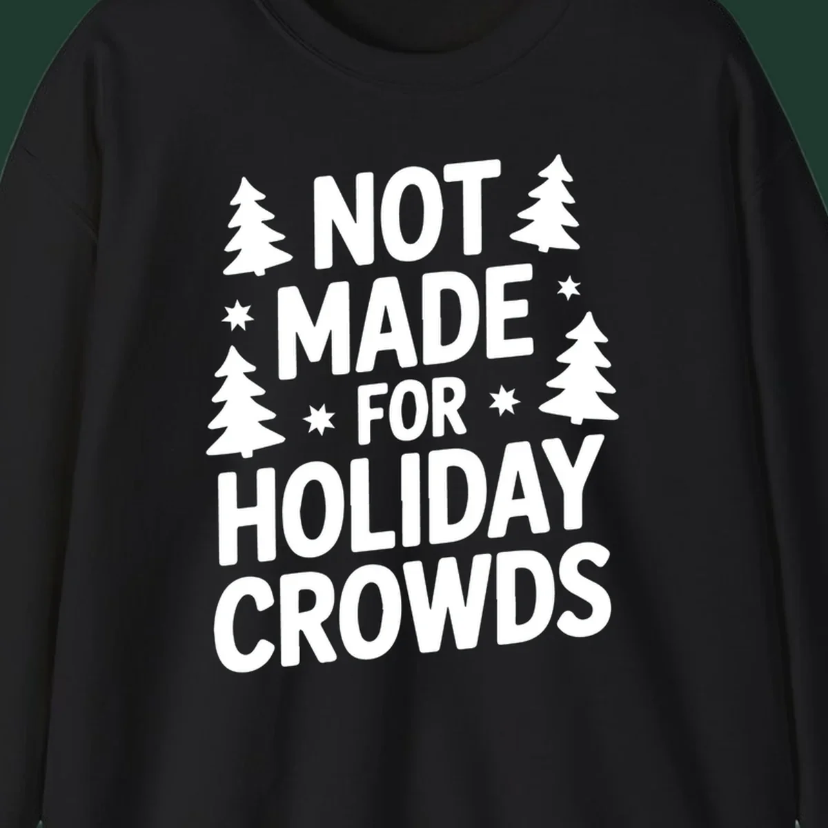 Typography design with 'NOT MADE FOR HOLIDAY CROWDS' text, Christmas trees, and stars.