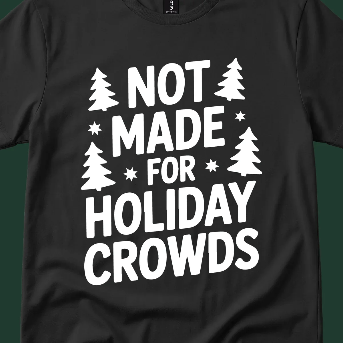 Typography design with 'NOT MADE FOR HOLIDAY CROWDS' text, Christmas trees, and stars.