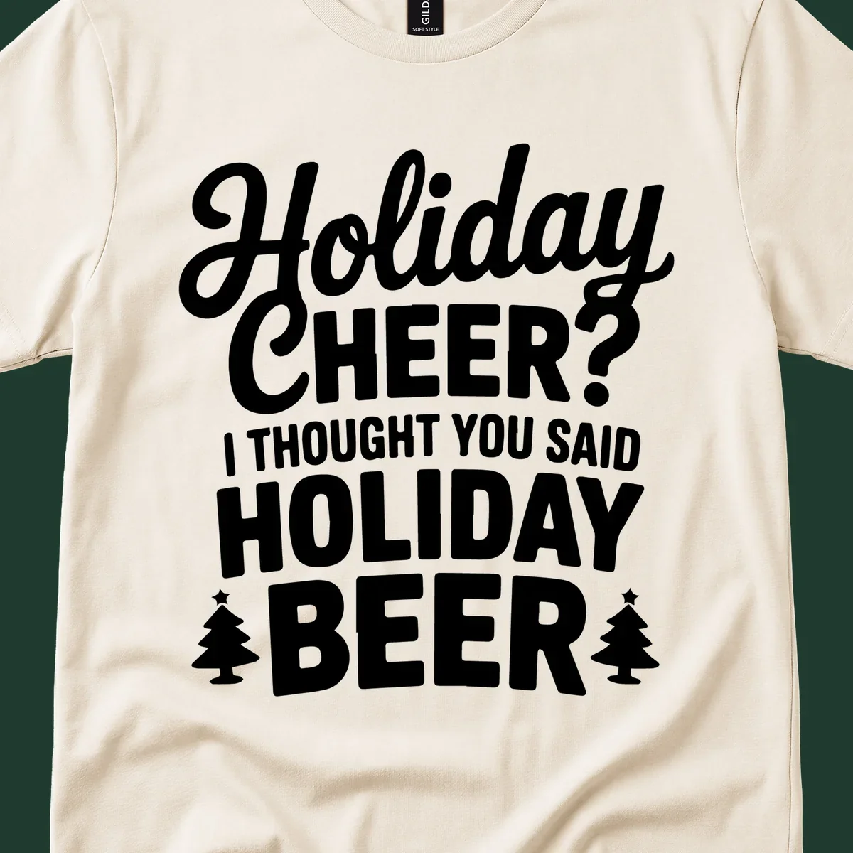 Holiday Beer pun graphic t-shirt design with playful text and Christmas tree icons.
