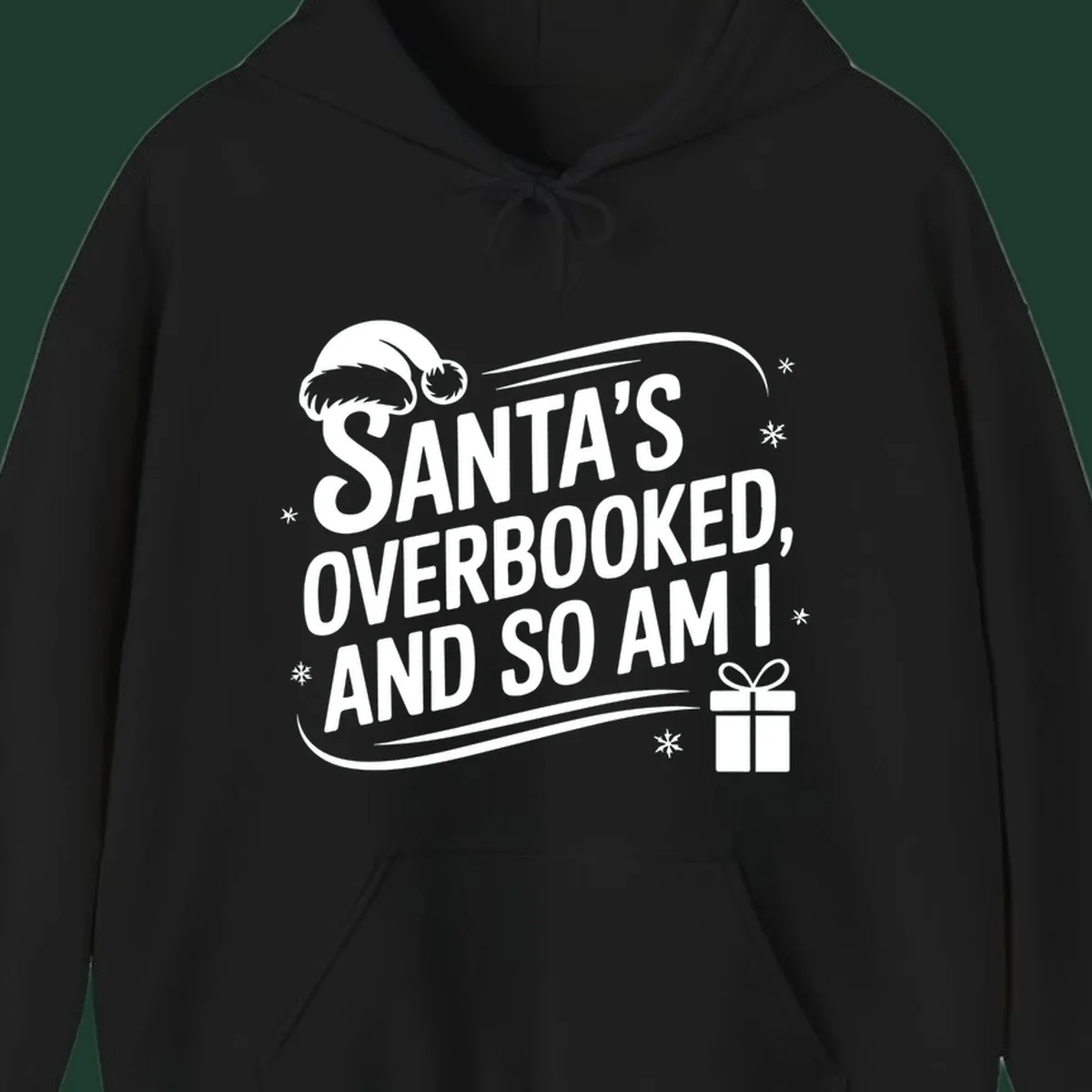 Santa's overbooked and so am I graphic with Santa hat and gift box.