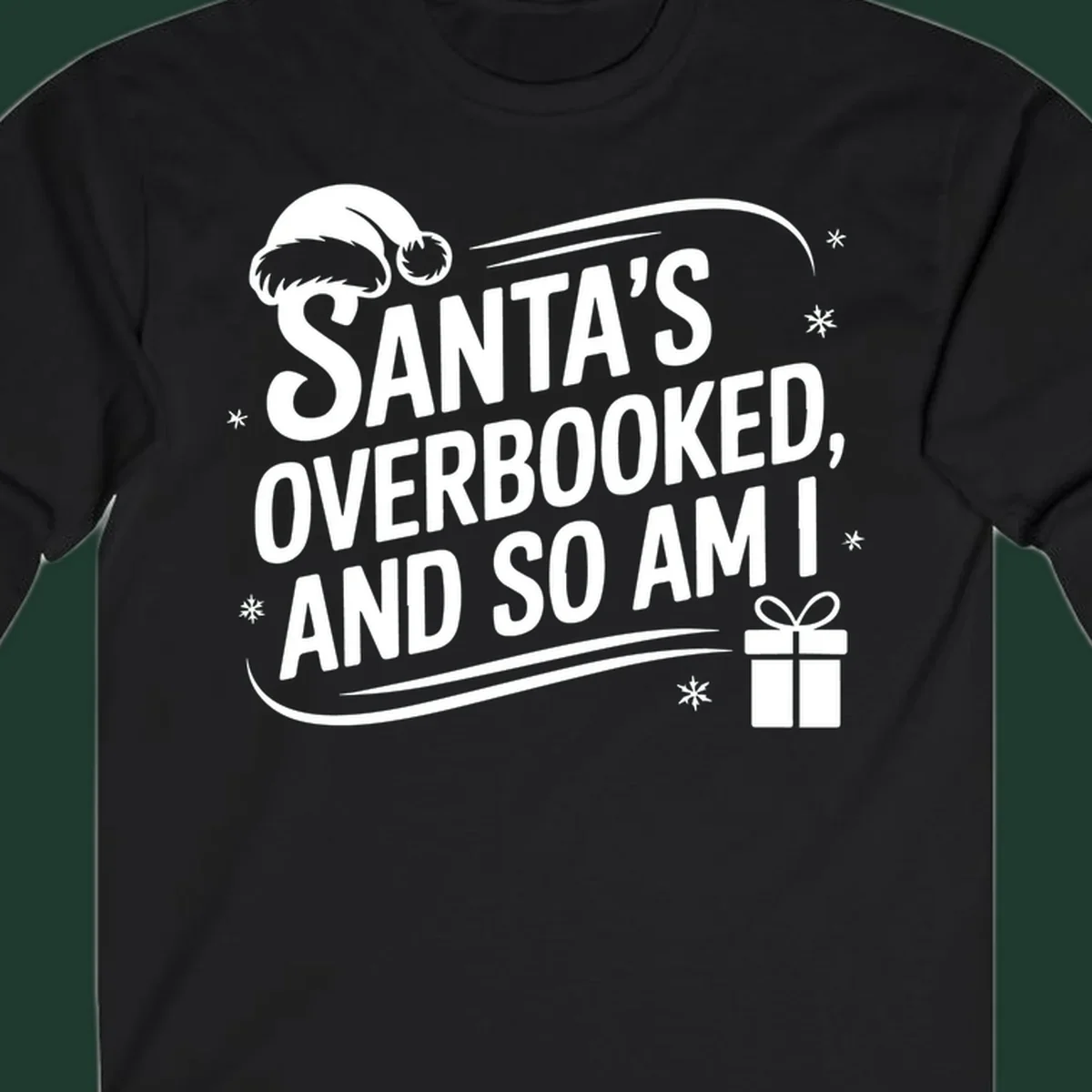 Santa's overbooked and so am I graphic with Santa hat and gift box.