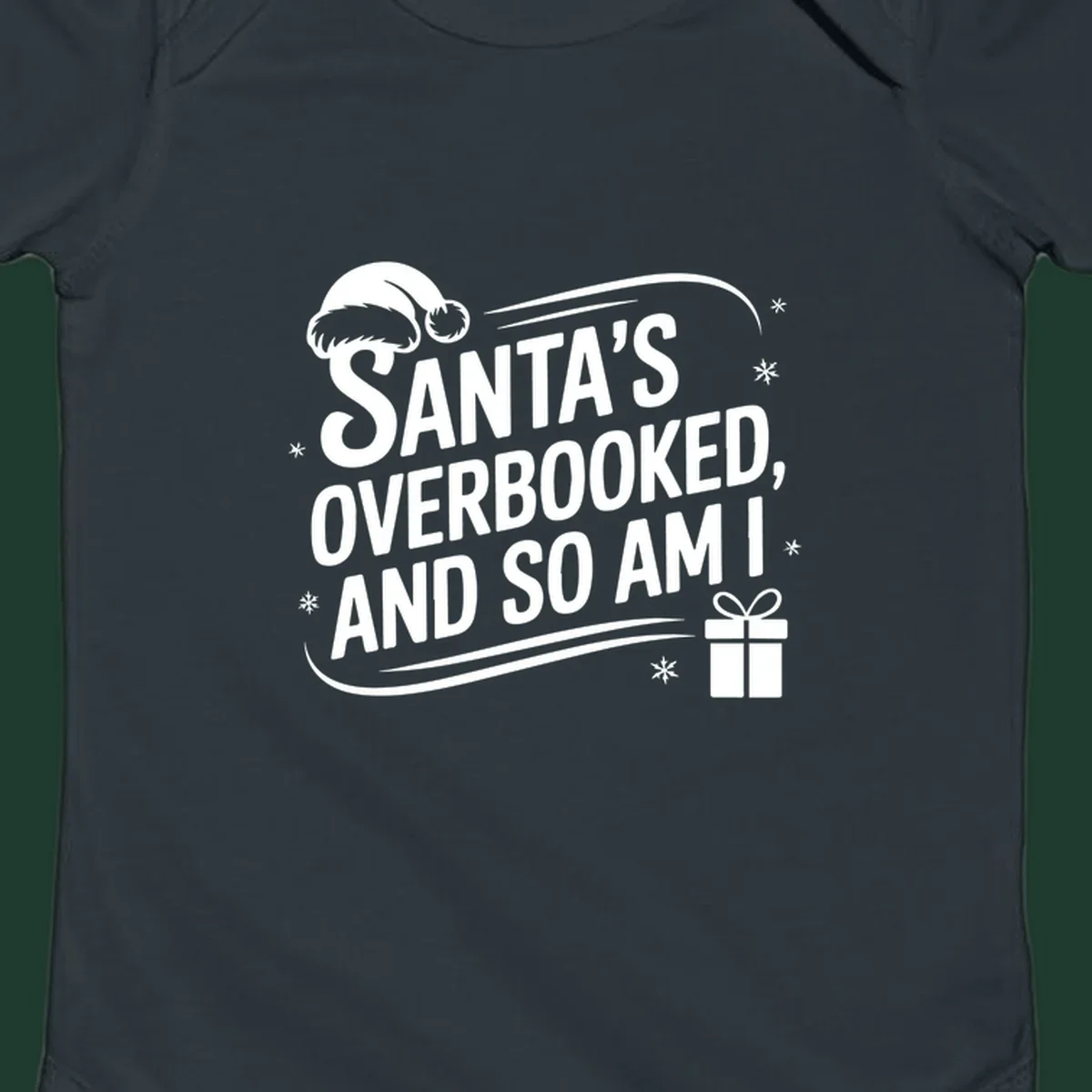 Santa's overbooked and so am I graphic with Santa hat and gift box.