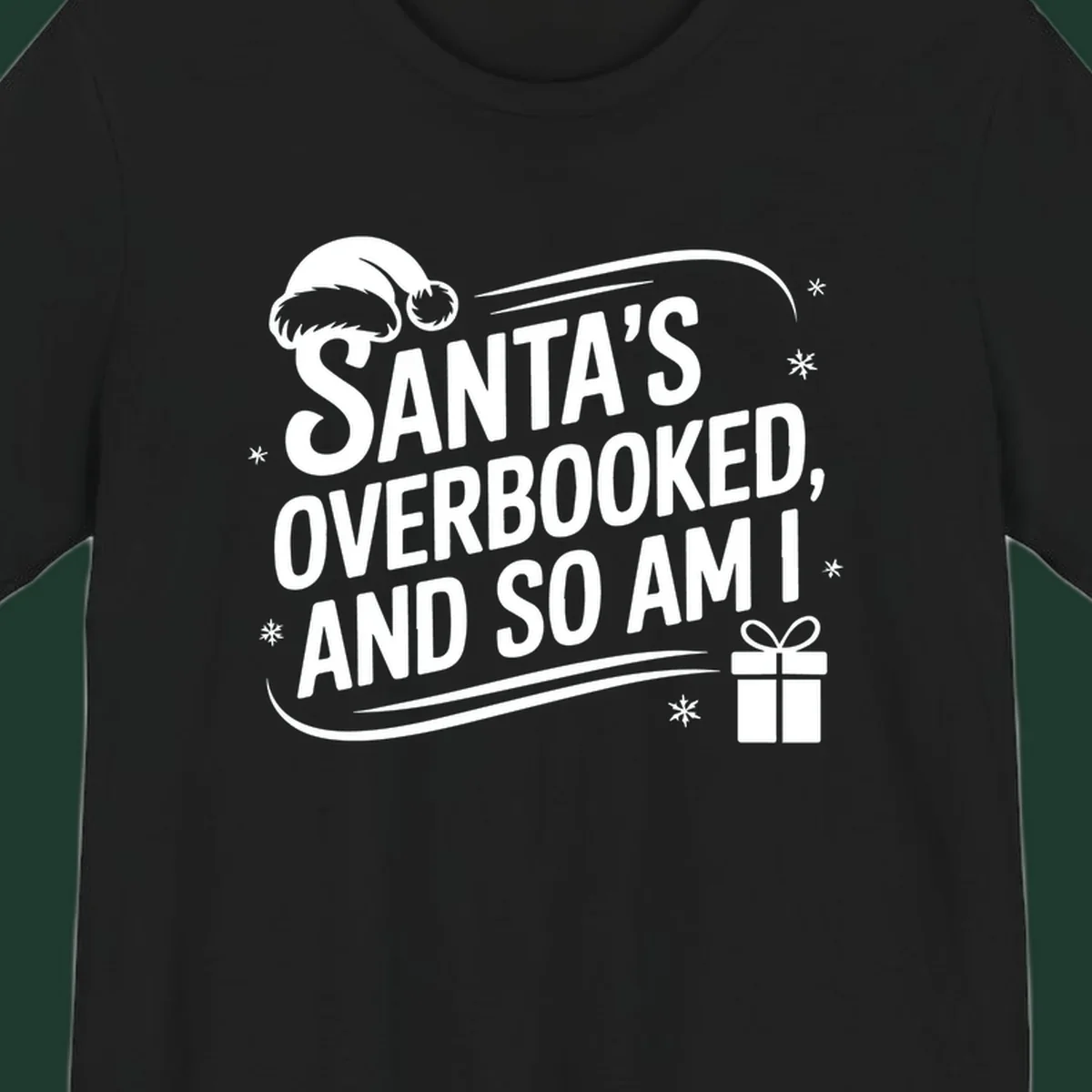 Santa's overbooked and so am I graphic with Santa hat and gift box.