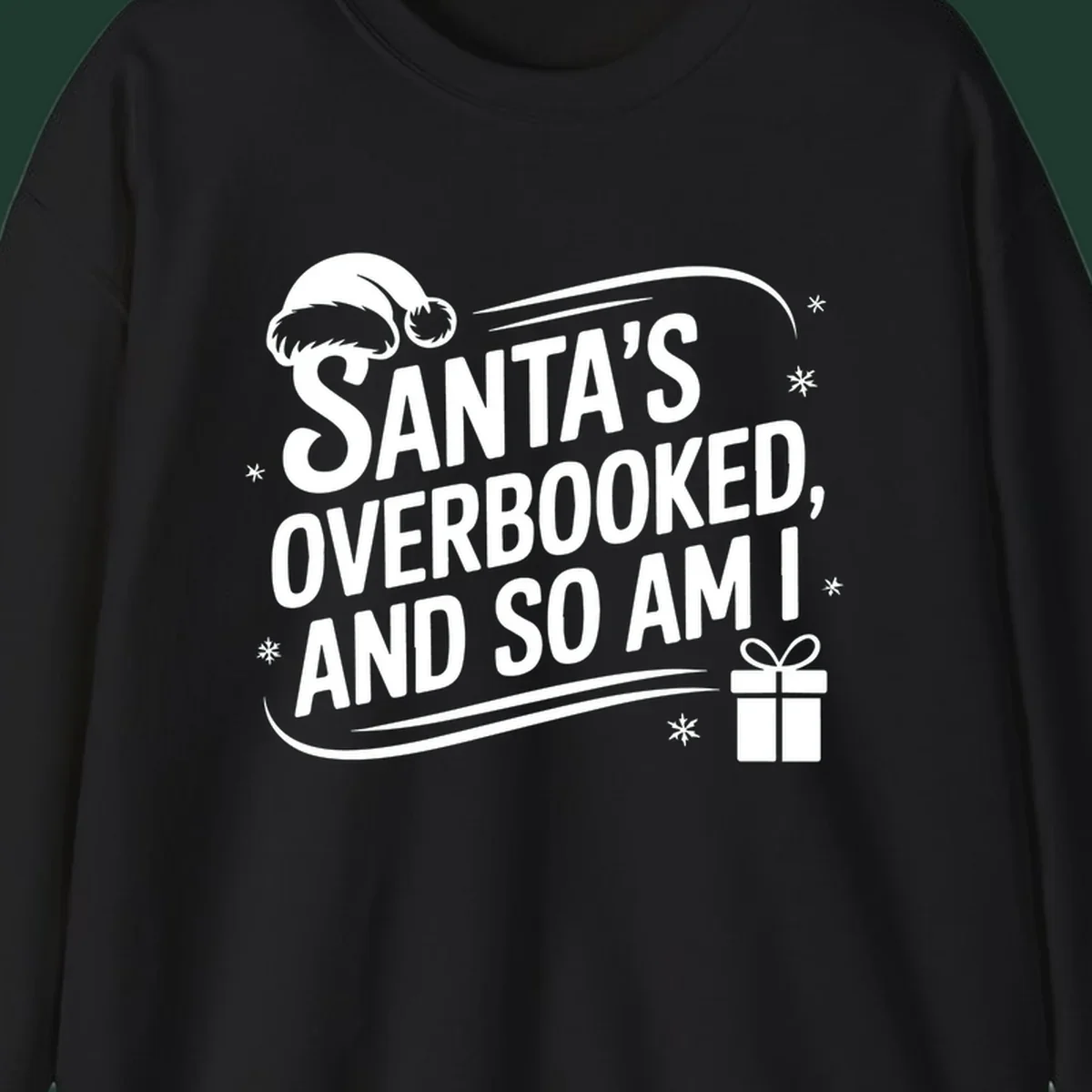 Santa's overbooked and so am I graphic with Santa hat and gift box.