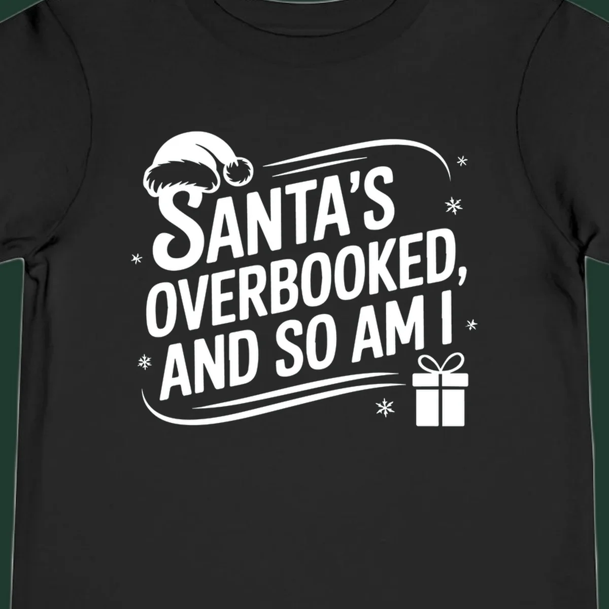 Santa's overbooked and so am I graphic with Santa hat and gift box.