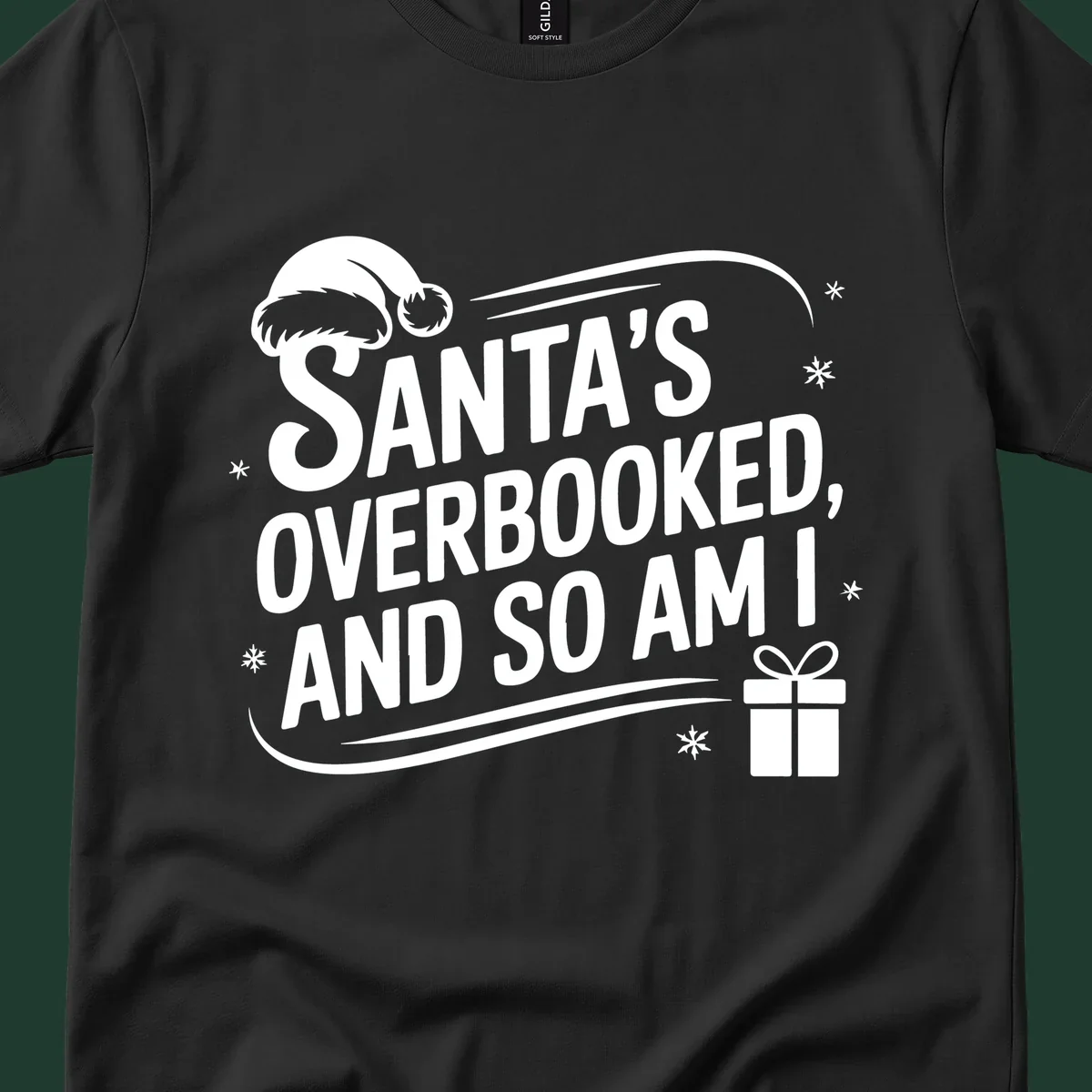 Santa's overbooked and so am I graphic with Santa hat and gift box.