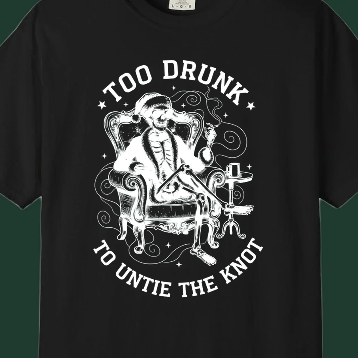 Drunk christmas skeleton in armchair, smoking, with text. Dark garment variant.