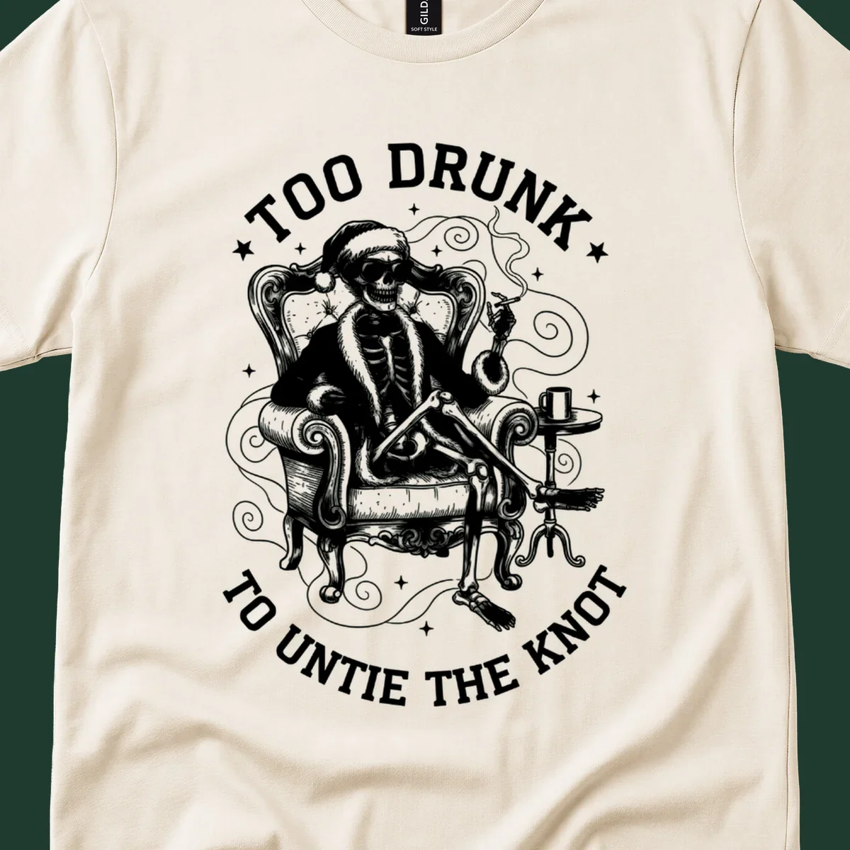 Drunk christmas skeleton in armchair, smoking, with text. Dark garment variant.