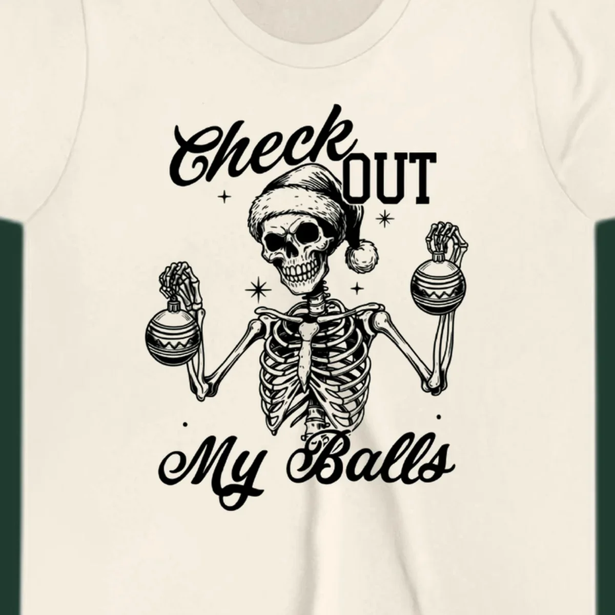 Skeleton wearing a Santa hat and holding Christmas ornaments, with text 'Check OUT My Balls'.