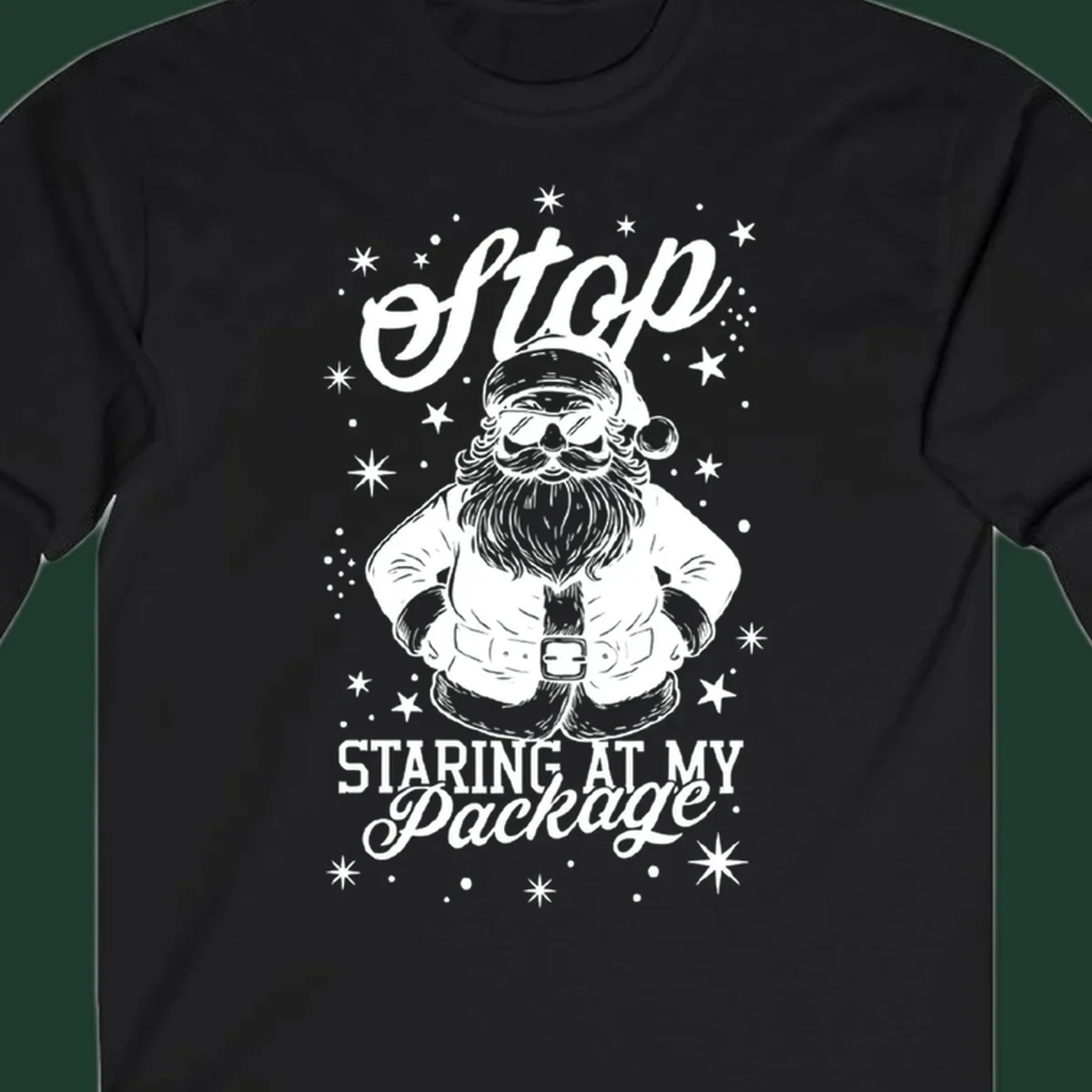 Santa Claus wearing sunglasses with the text 'Stop STARING AT MY Package', part of the santa-package-joke concept.