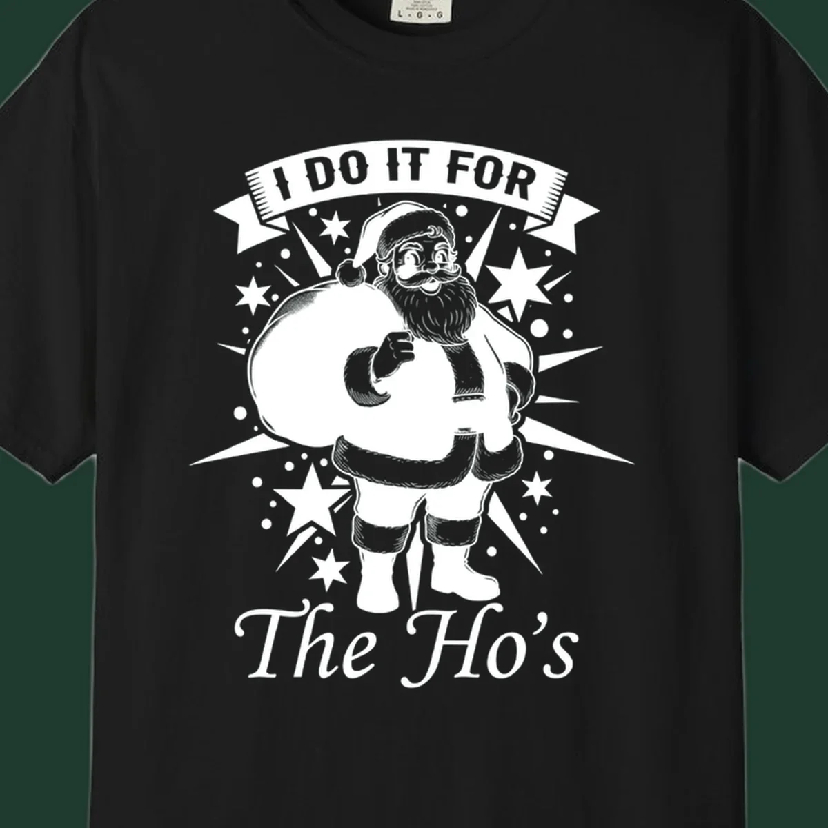 Santa Claus illustration with text 'I DO IT FOR The Ho's', for a Christmas graphic tee.