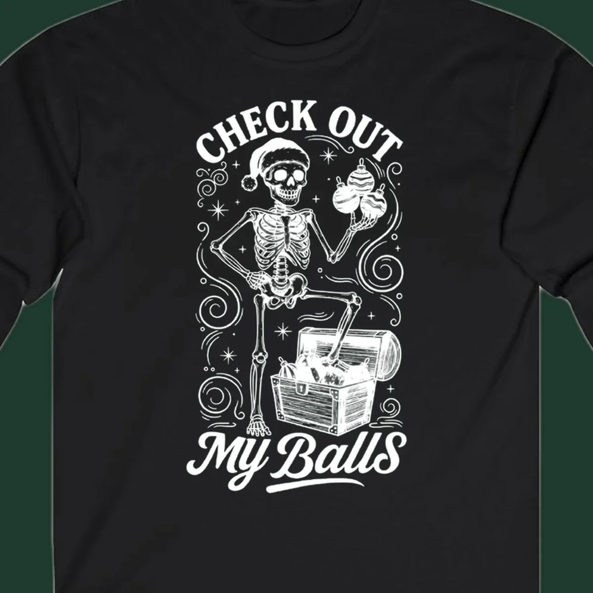 Skeleton in Santa hat holding ornaments next to treasure chest, with text 'CHECK OUT MY Balls'.