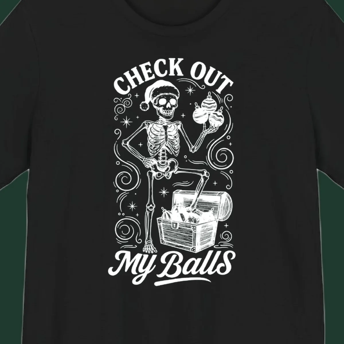 Skeleton in Santa hat holding ornaments next to treasure chest, with text 'CHECK OUT MY Balls'.