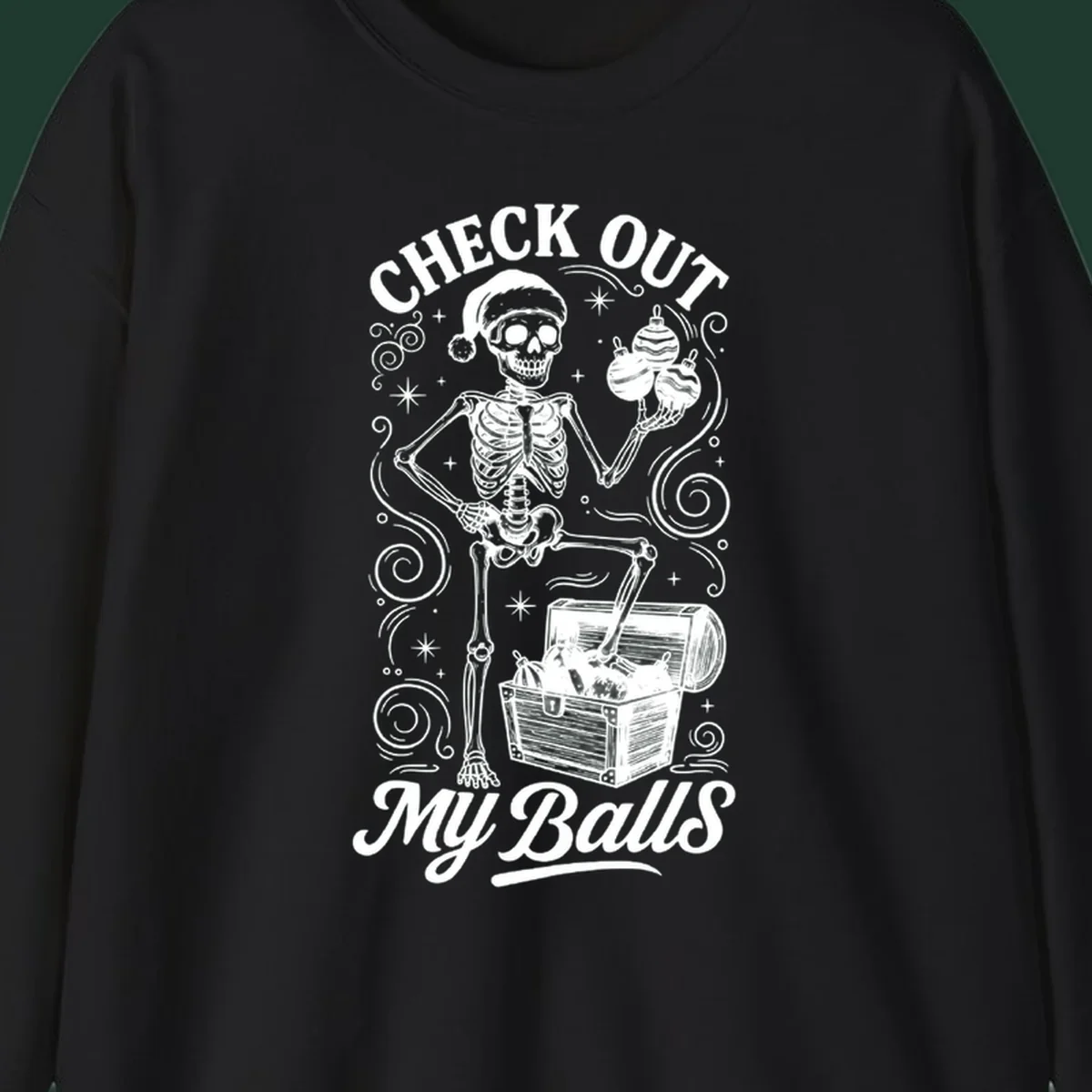 Skeleton in Santa hat holding ornaments next to treasure chest, with text 'CHECK OUT MY Balls'.