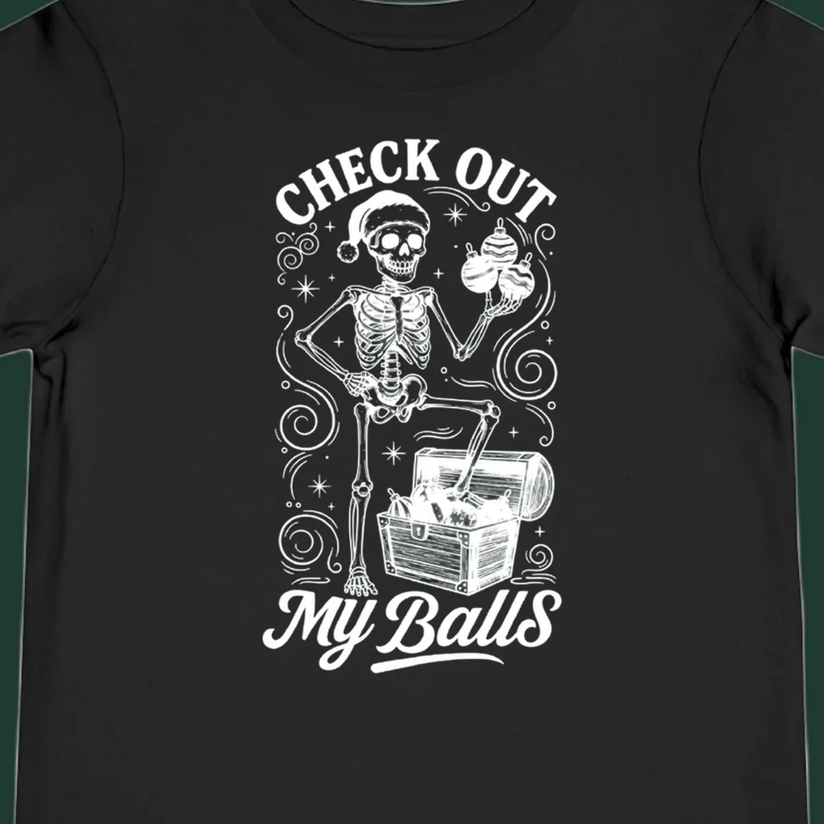 Skeleton in Santa hat holding ornaments next to treasure chest, with text 'CHECK OUT MY Balls'.