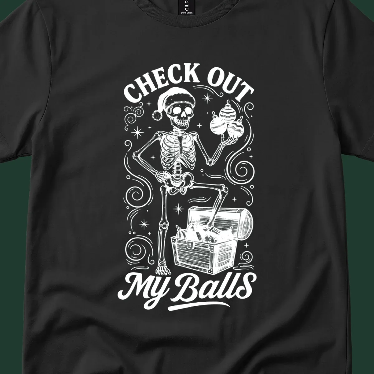 Skeleton in Santa hat holding ornaments next to treasure chest, with text 'CHECK OUT MY Balls'.