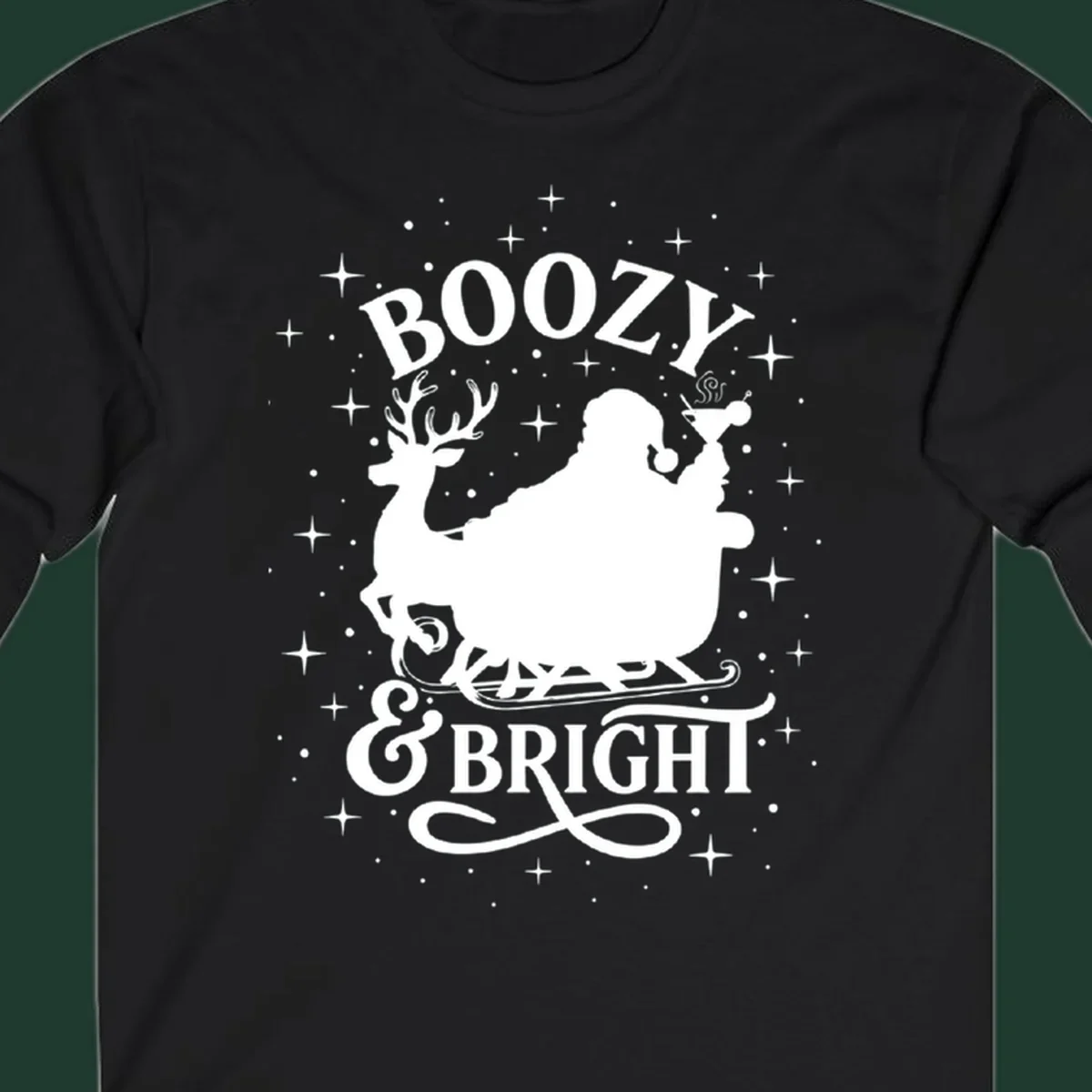 Boozy & Bright Christmas design with Santa, reindeer, sleigh, martini, and stars.