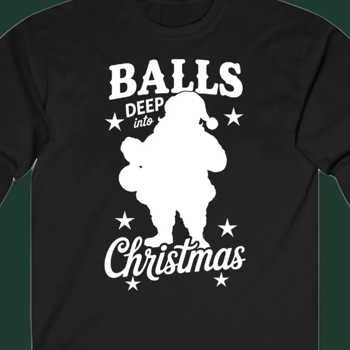 Balls deep into Christmas design with Santa silhouette and stars.