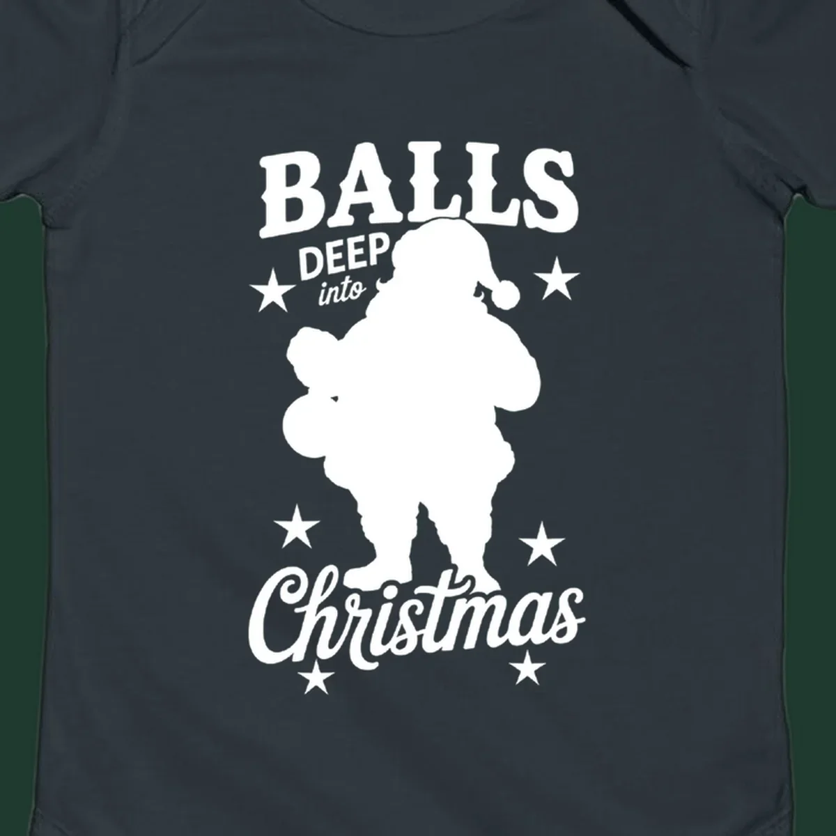 Balls deep into Christmas design with Santa silhouette and stars.