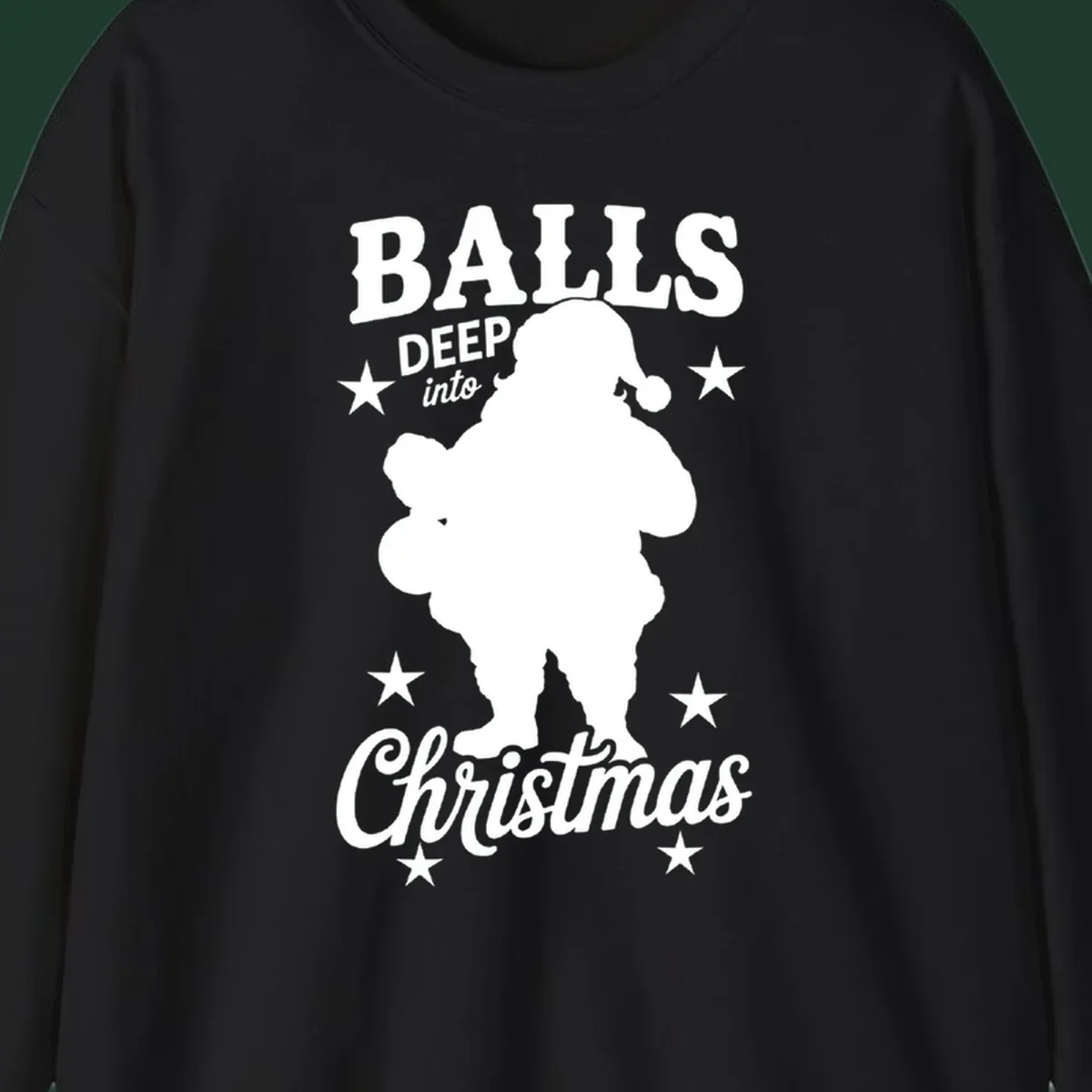 Balls deep into Christmas design with Santa silhouette and stars.