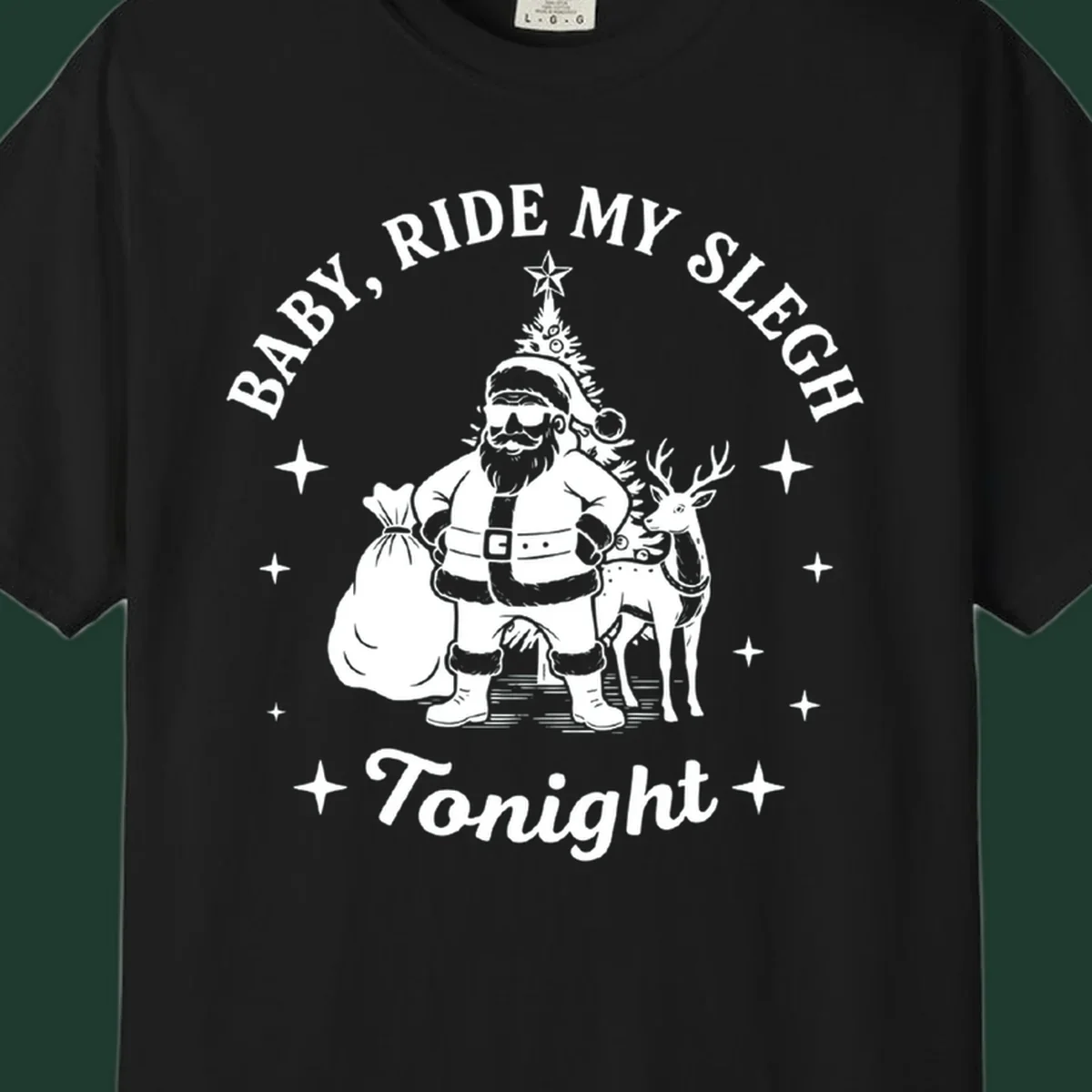Baby, ride my sleigh tonight graphic featuring Santa, reindeer, and Christmas tree.