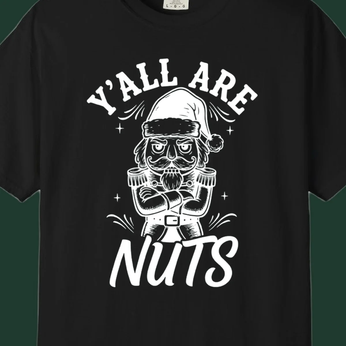 Nutcracker illustration with 'Y'ALL ARE NUTS' text, a holiday graphic.