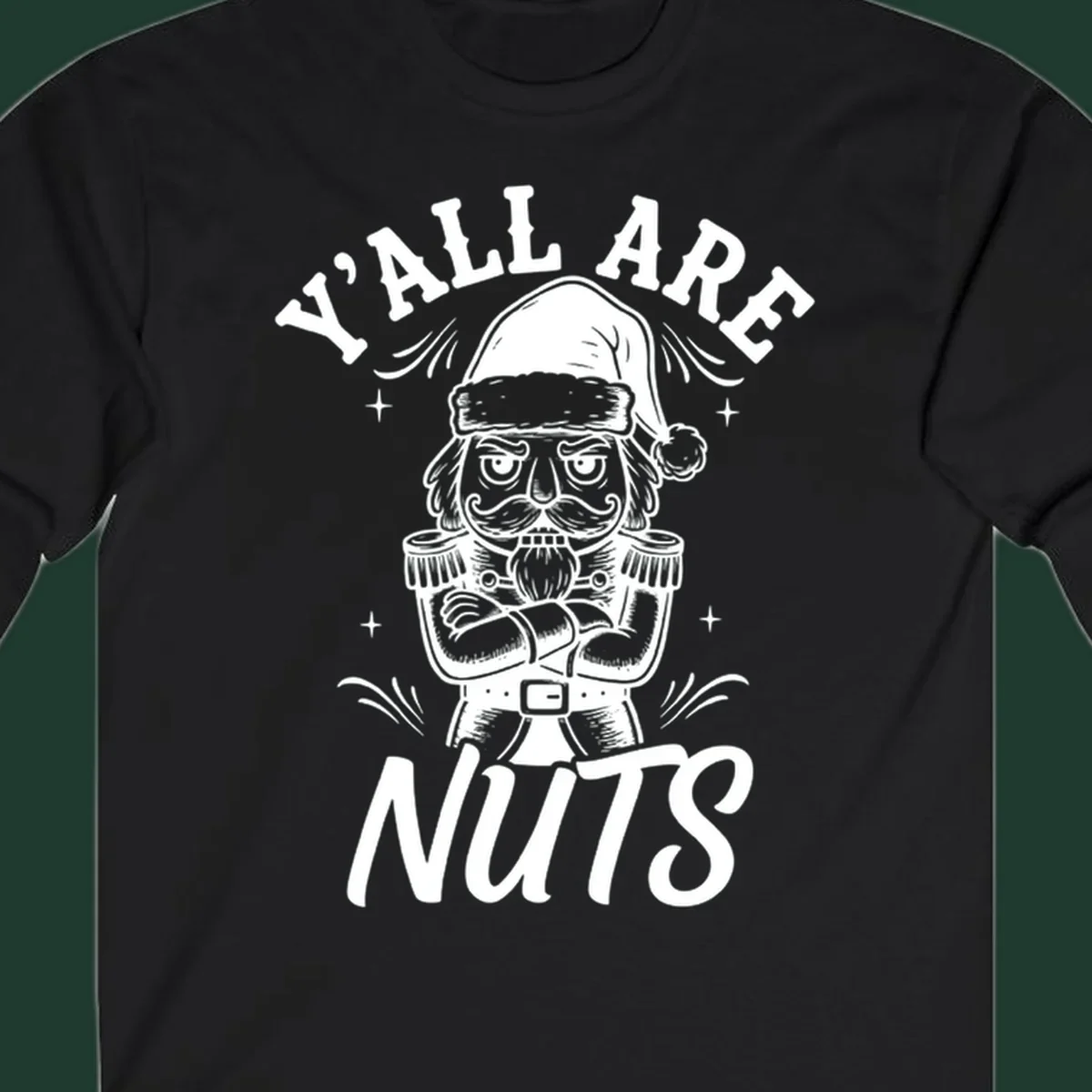 Nutcracker illustration with 'Y'ALL ARE NUTS' text, a holiday graphic.