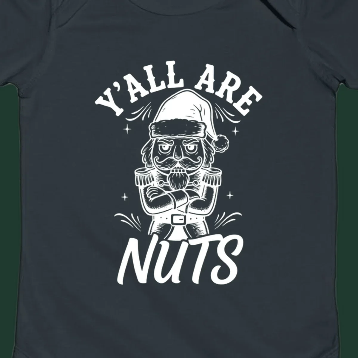 Nutcracker illustration with 'Y'ALL ARE NUTS' text, a holiday graphic.