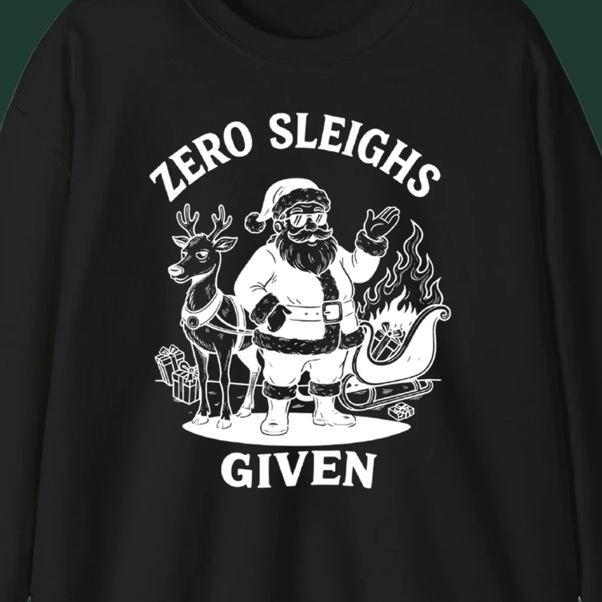 Zero sleighs given graphic tee with cool Santa, reindeer, and flaming sleigh.
