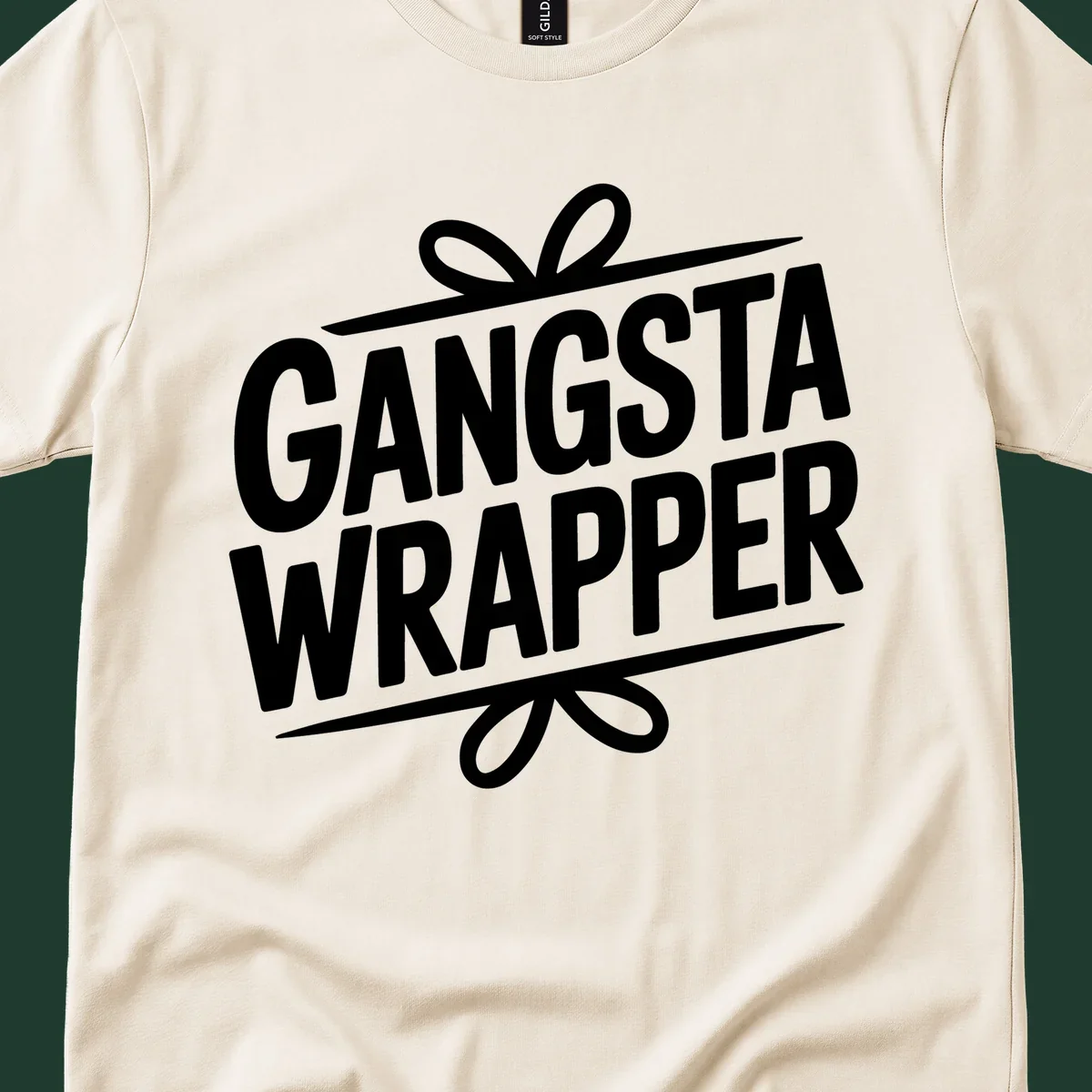 Gangsta Wrapper Christmas Design with bold white text and gift ribbon graphic.