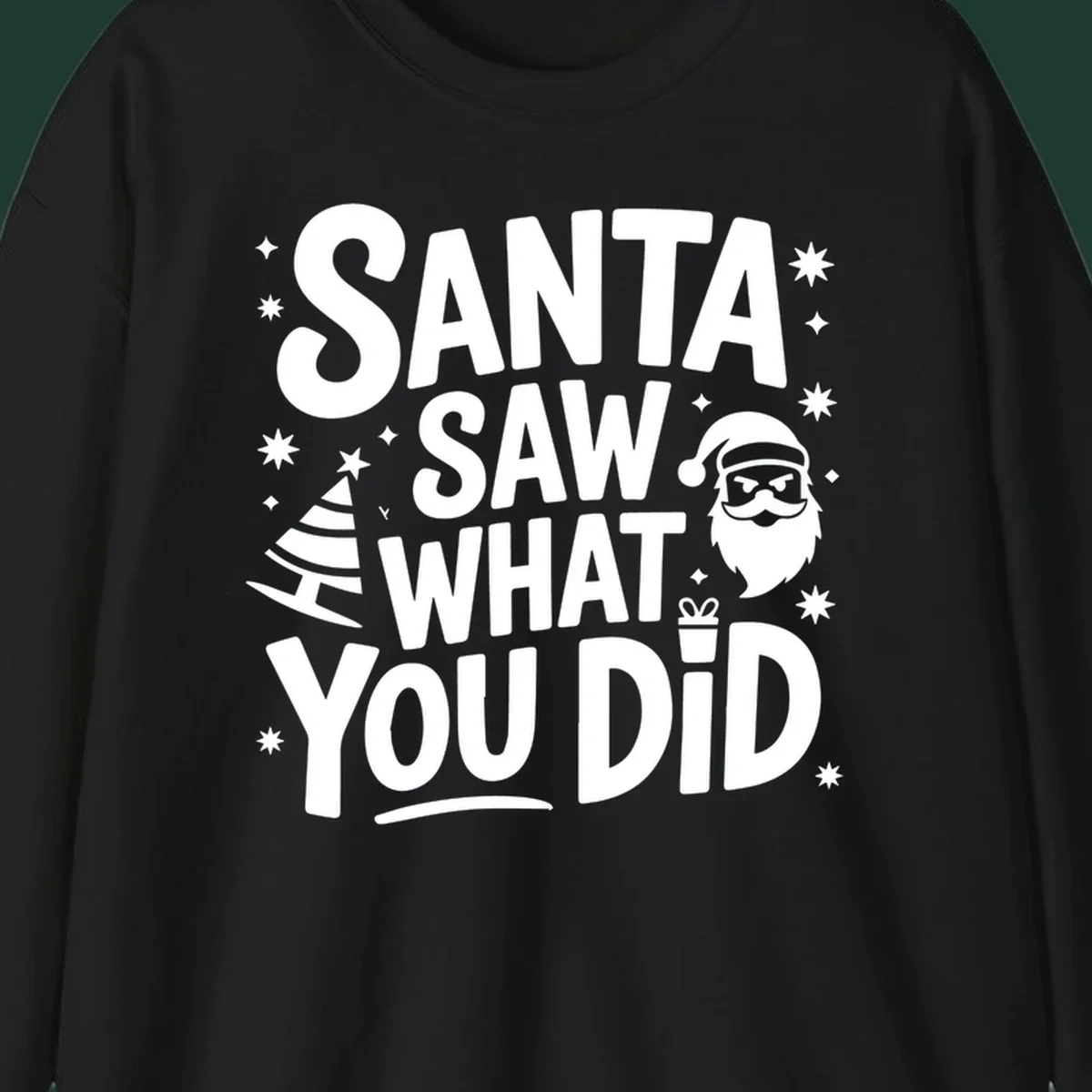 Santa saw what you did graphic t-shirt with Santa, tree, gift, and stars.