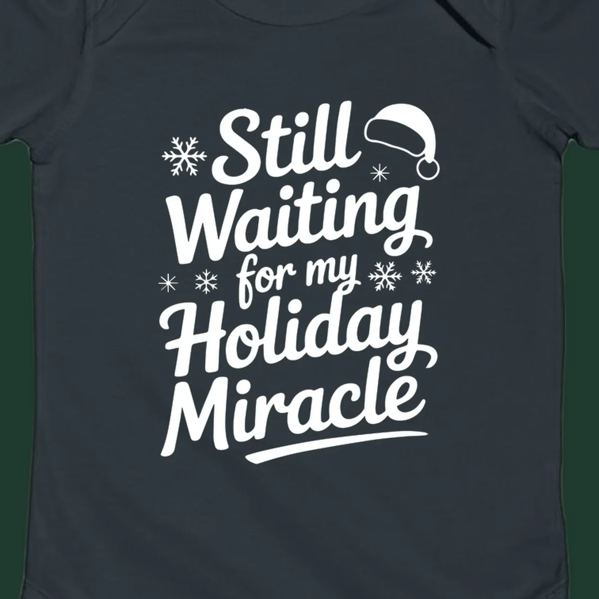 Text reading "Still Waiting for my Holiday Miracle" with snowflakes and a Santa hat graphic.
