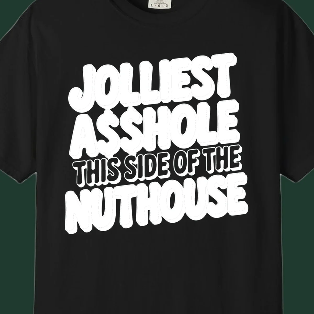 Typography design reading "Jolliest Asshole This Side Of The Nuthouse" in a bold, cartoonish font.