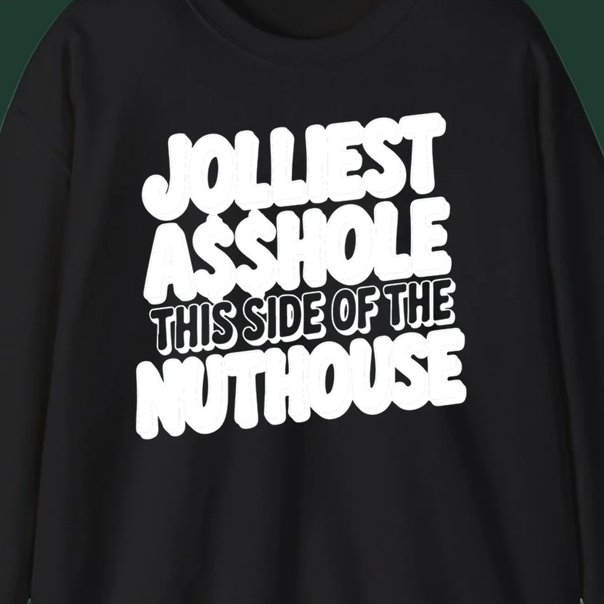 Typography design reading "Jolliest Asshole This Side Of The Nuthouse" in a bold, cartoonish font.
