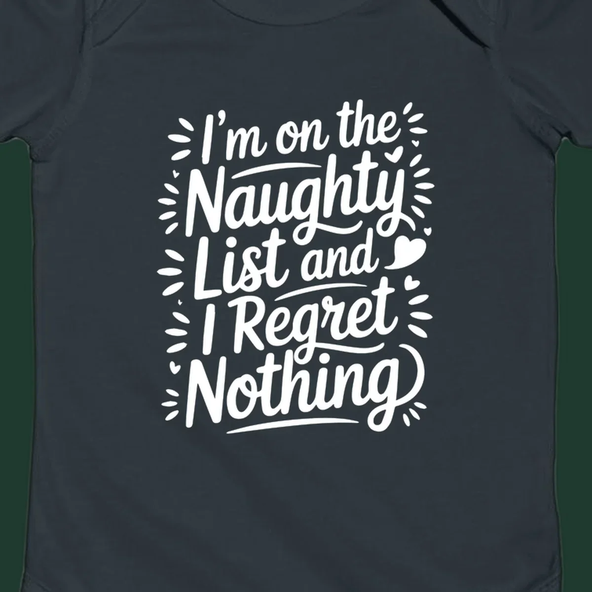 Typography design with the phrase 'I'm on the Naughty List and I Regret Nothing', featuring hand-lettered text and decorative elements.