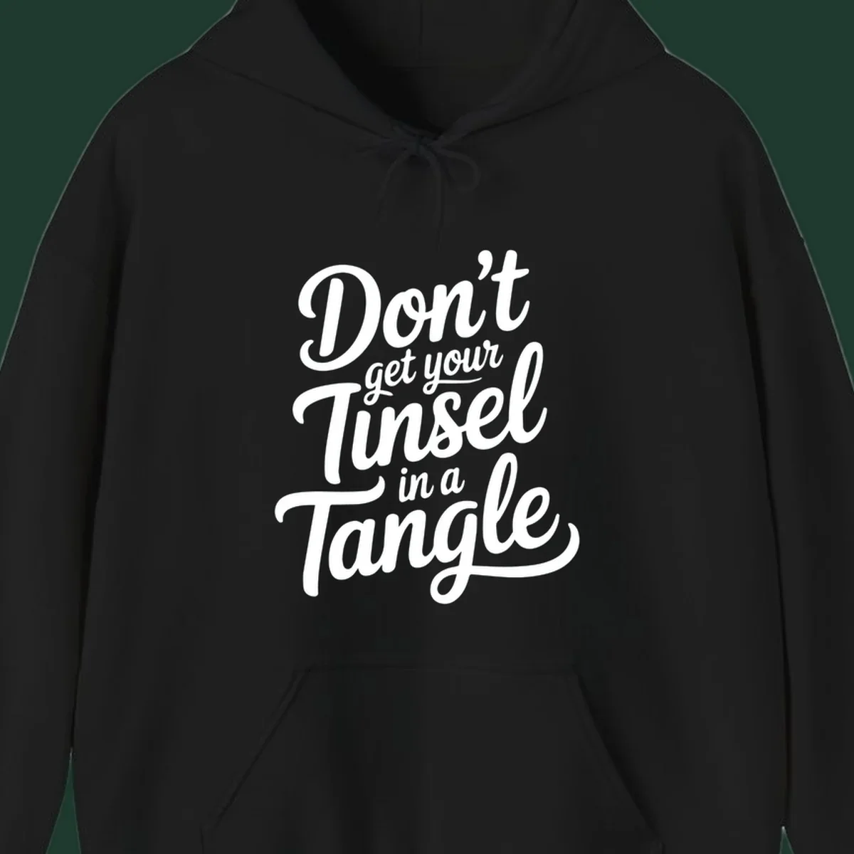 Don't Get Your Tinsel in a Tangle phrase in white script typography.