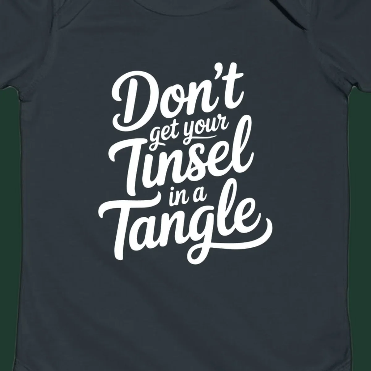 Don't Get Your Tinsel in a Tangle phrase in white script typography.