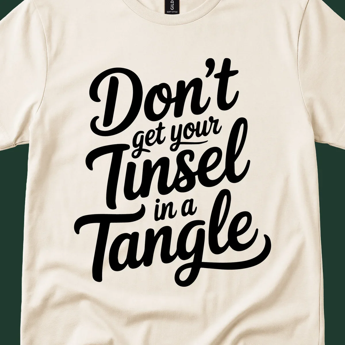Don't Get Your Tinsel in a Tangle phrase in white script typography.