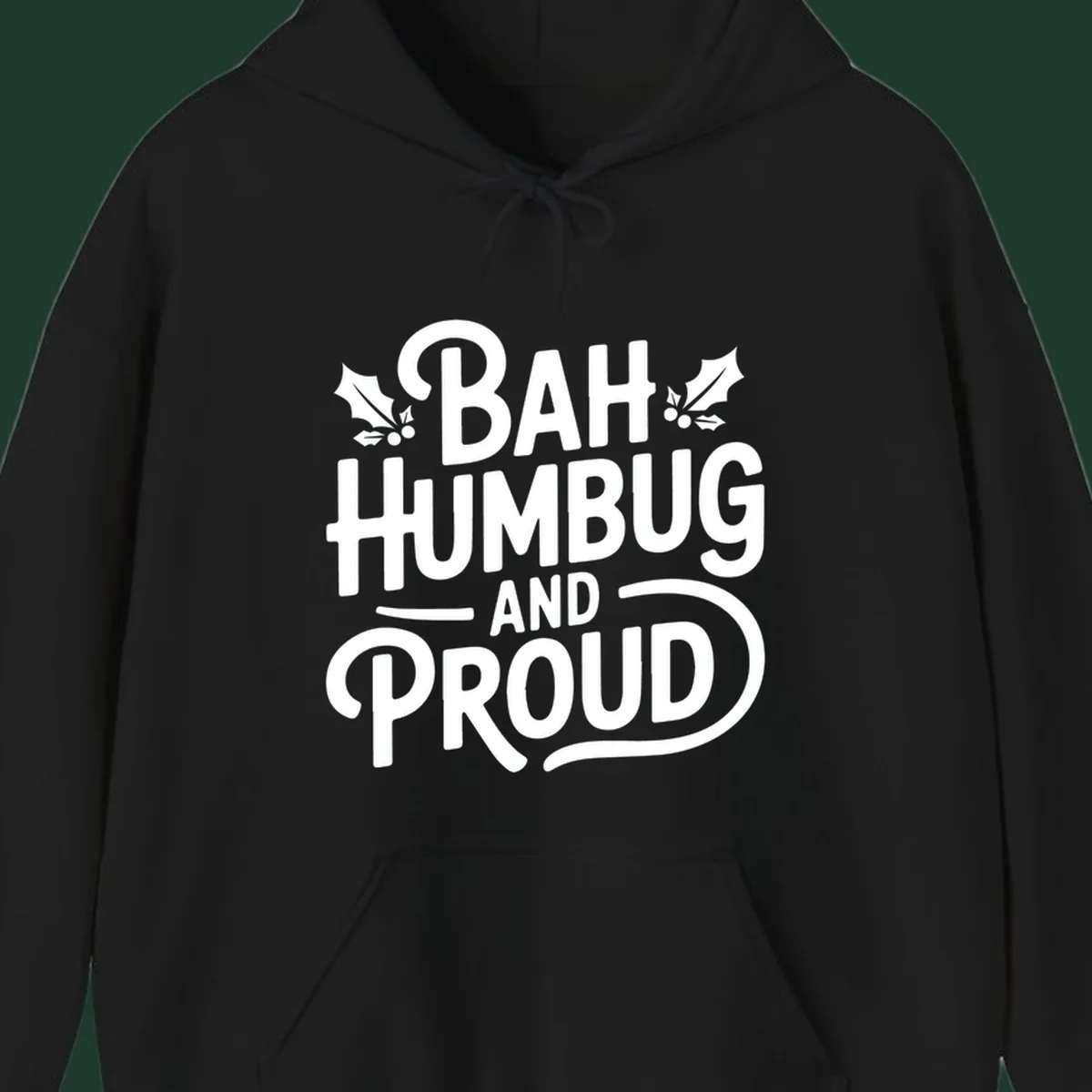 Bah humbug and proud typography design with holly leaves.