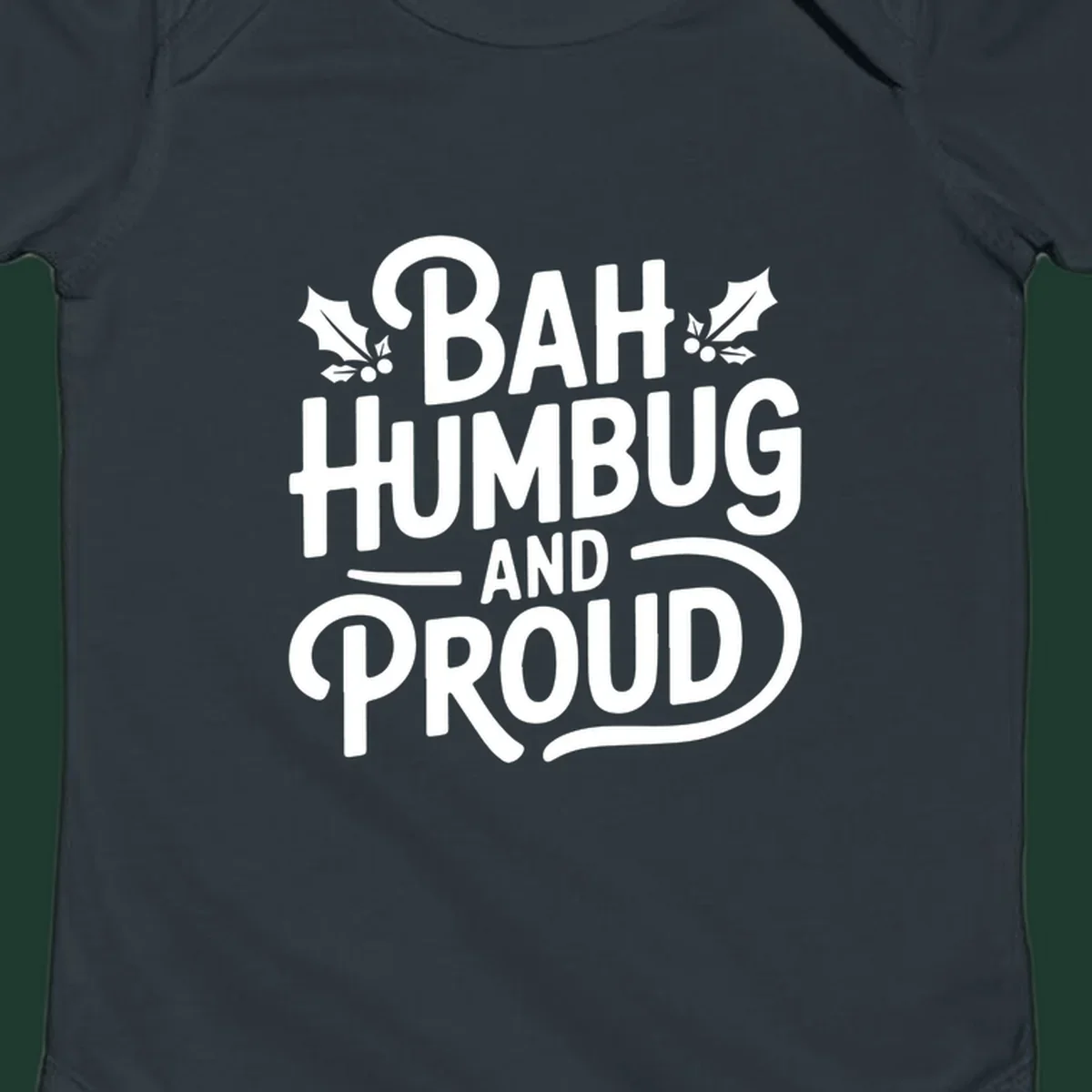 Bah humbug and proud typography design with holly leaves.