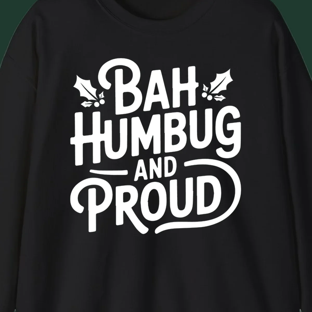 Bah humbug and proud typography design with holly leaves.