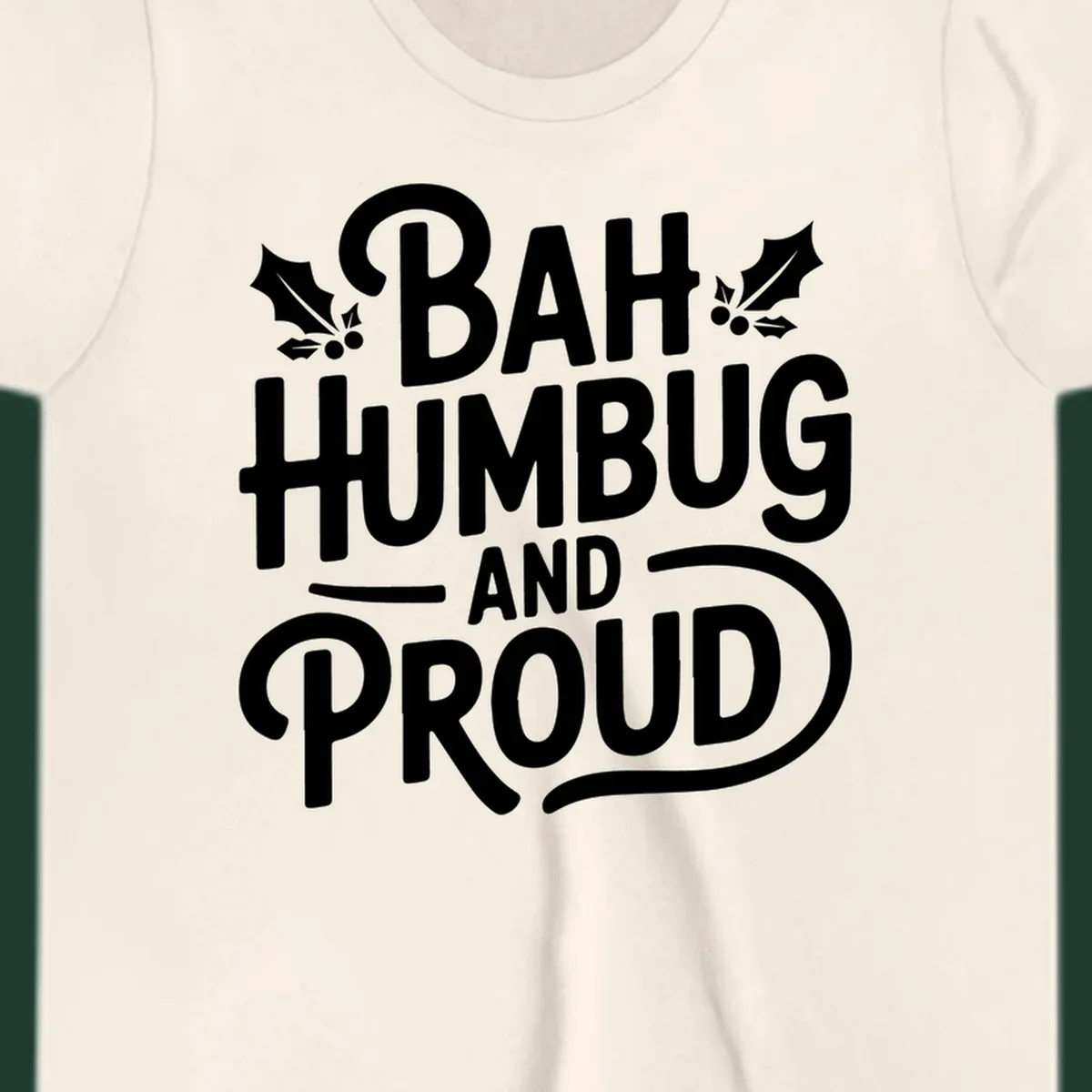 Bah humbug and proud typography design with holly leaves.
