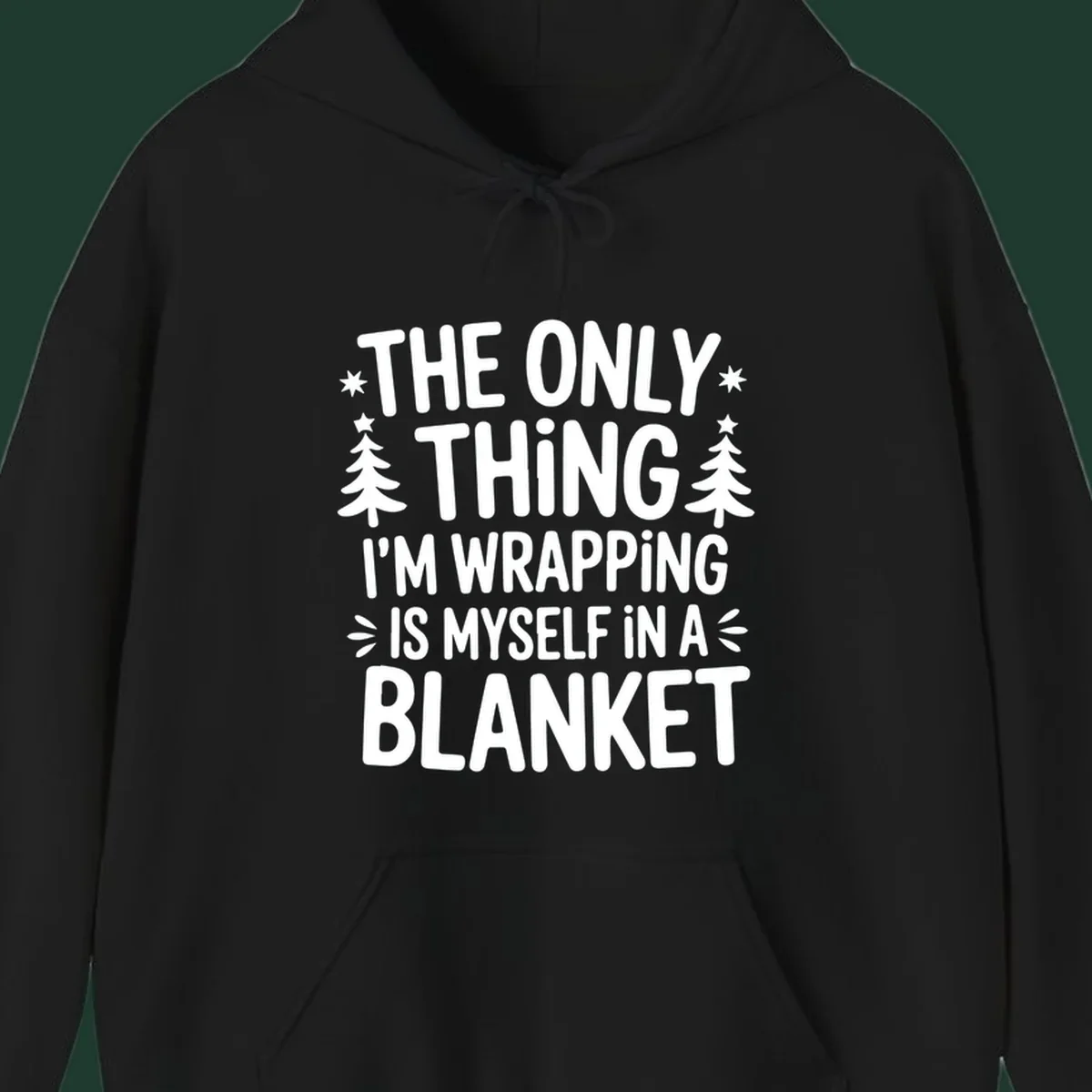 The Only Thing I'm Wrapping Is Myself In A Blanket text design with stars and Christmas trees.