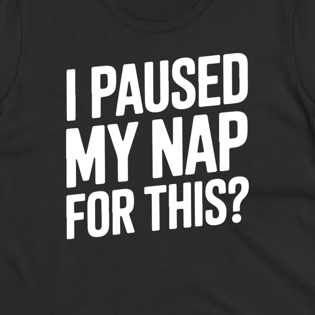 White typography quote 'I PAUSED MY NAP FOR THIS?' on a black background.