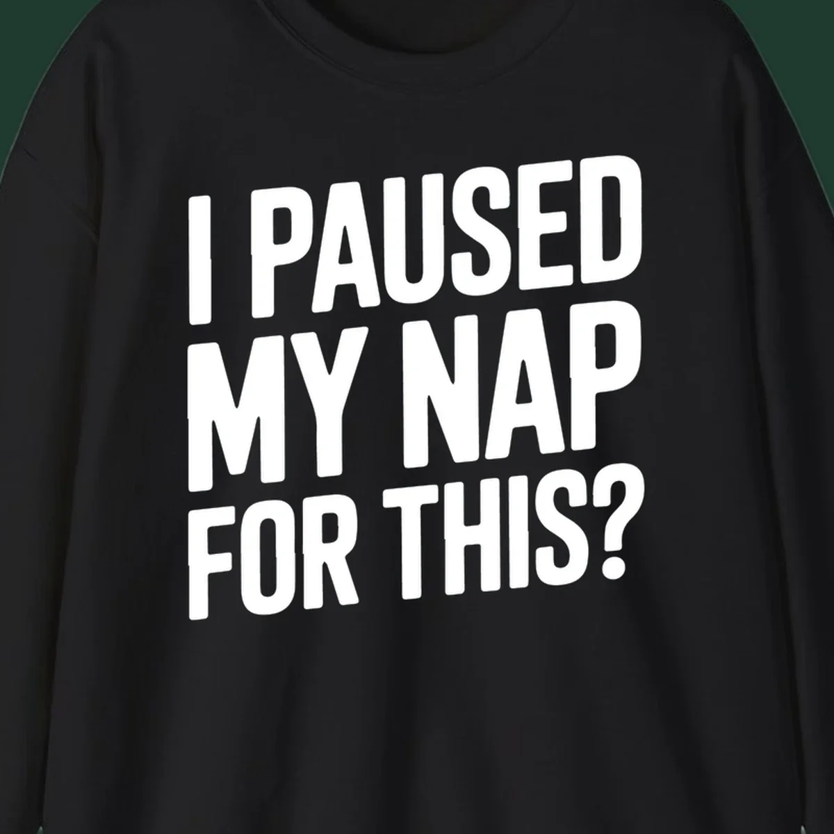 White typography quote 'I PAUSED MY NAP FOR THIS?' on a black background.